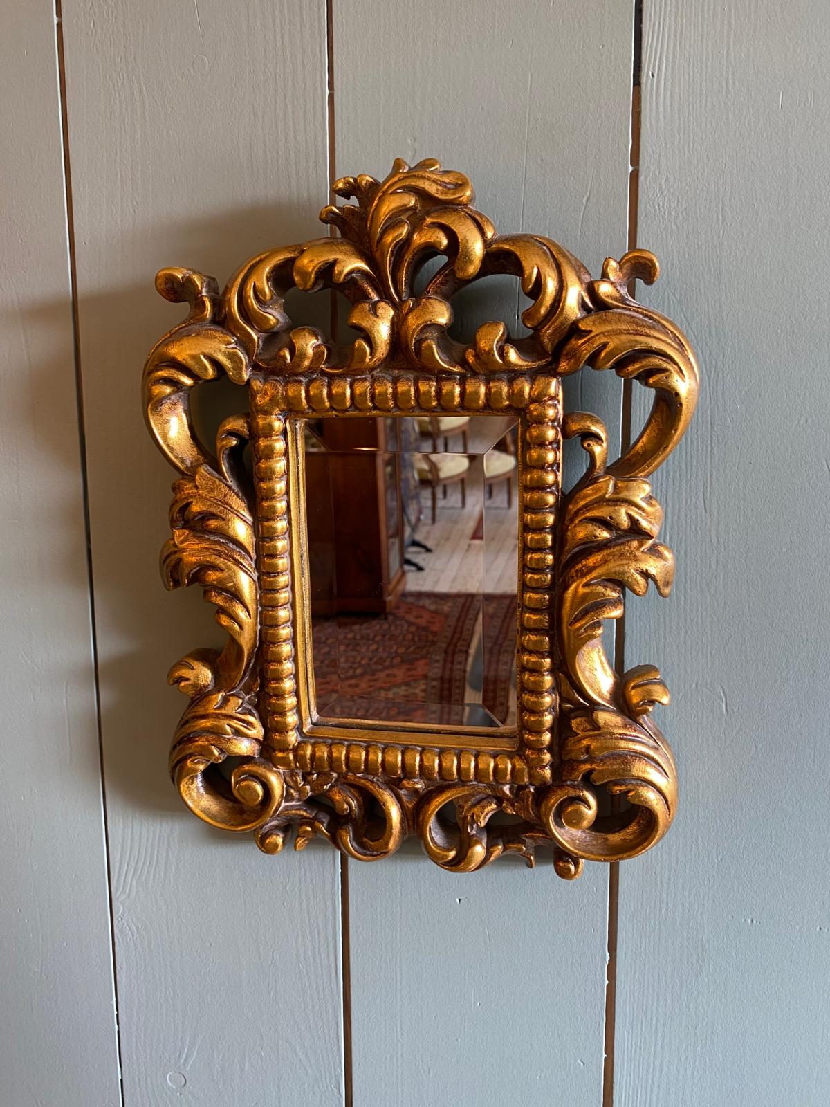 Small Decoratively Carved Mirror