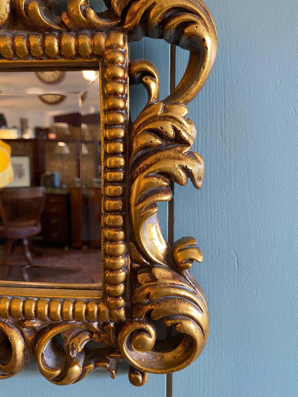 Small Decoratively Carved Mirror