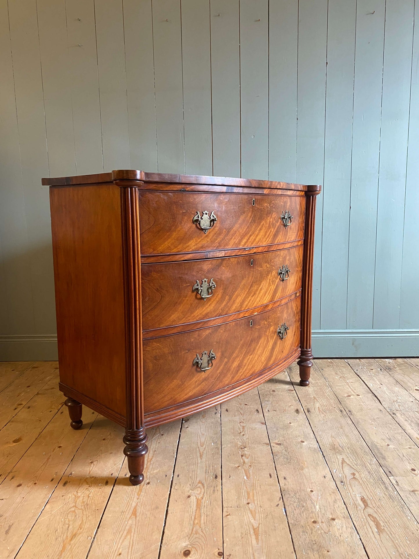 Georgian Bow Front Flame Mahogany Chest Of Drawers