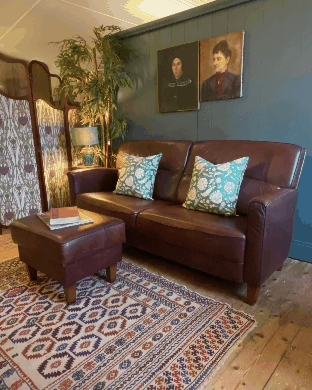 Vintage Leather two-seat sofa and footstool
