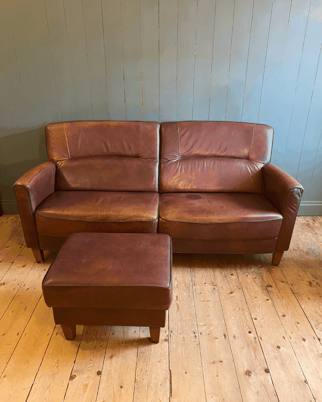 Vintage Leather two-seat sofa and footstool