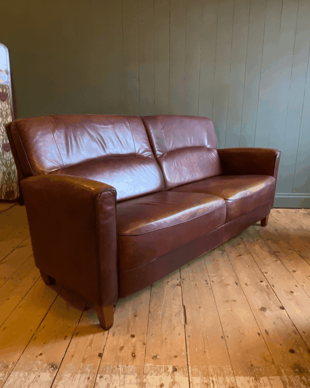 Vintage Leather two-seat sofa and footstool