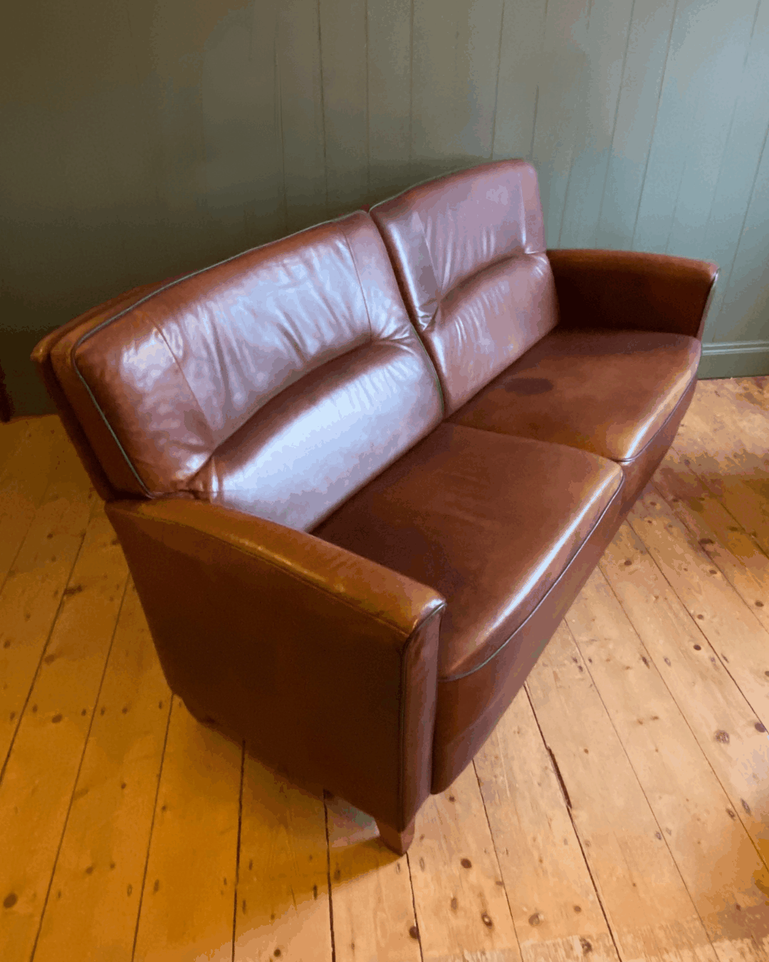 Vintage Leather two-seat sofa and footstool