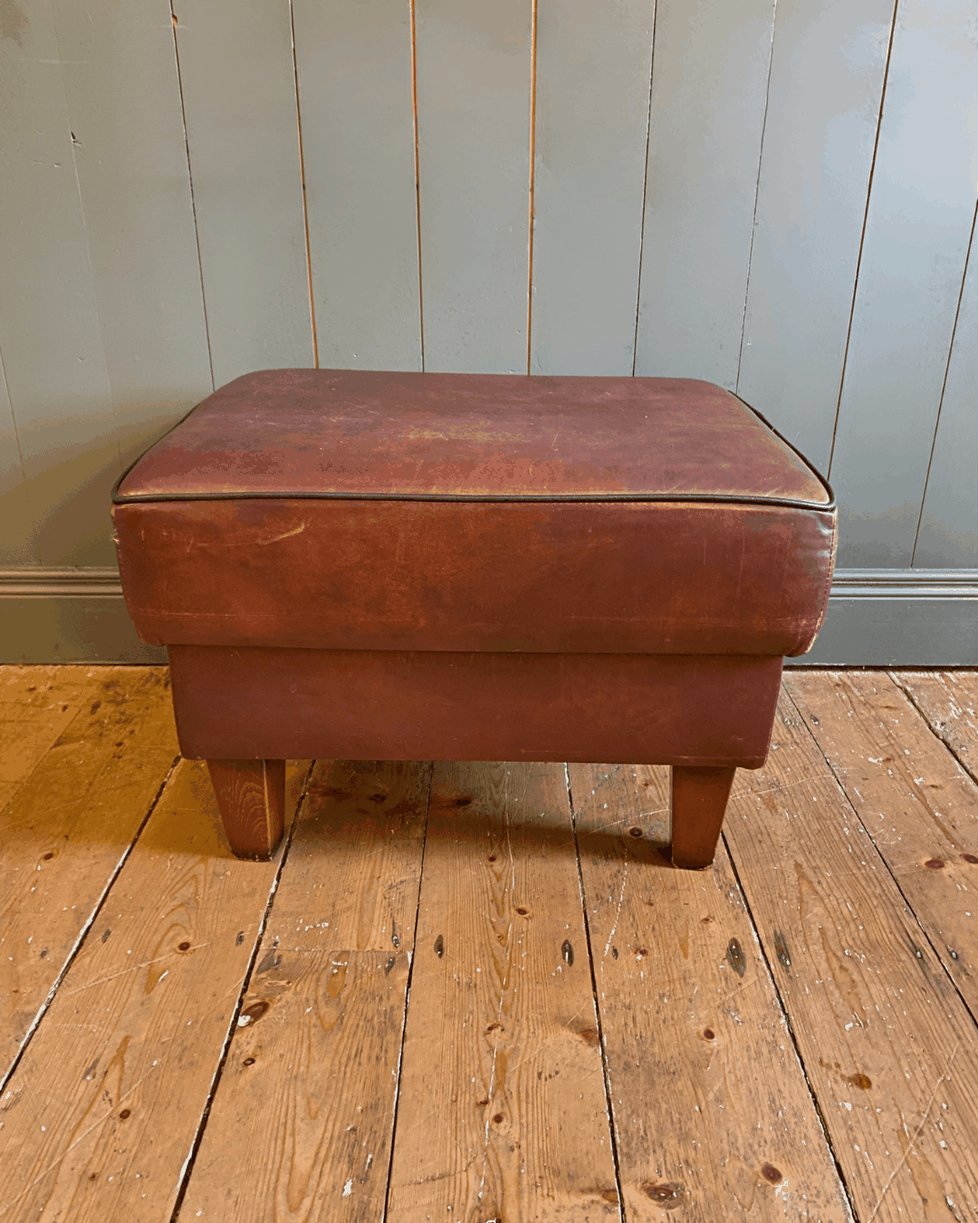 Vintage Leather two-seat sofa and footstool